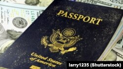 Generic - USA Passport with American Currency, ­Shutterstock photo