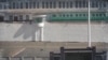 Заборы в 8 метров, КПП, сторожевые вышки. Блогер в Китае снял на видео засекреченные "лагеря перевоспитания", которых нет на картах