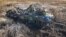 UKRAINE – A damaged Russian tank with a mine roller is seen in a field near the town of Vuhledar, amid Russia's attack on Ukraine, in Donetsk region, Ukraine in this handout picture released November 5, 2023
