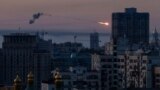 UKRAINE -- An explosion of a missile is seen in the sky over the city during a Russian missile strike, amid Russia's attack on Ukraine, in Kyiv, Ukraine May 18, 2023. 