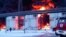 RUSSIA – In this photo taken from video released by Governor of Bryansk Region Alexander Bogomaz telegram channel AV BogomaZ on 19Jan.2024, Russian Emergency Ministry employees work at the side of fire of oil reservoirs after the drone reached Klintsy