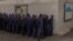 UKRAINE - Russian prisoners of war queue for lunch at a camp for Russian POWs in western Ukraine on September 19, 2023