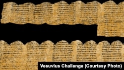 Расшифрованный текст (цвет папируса добавлен при обработке, в реальности фон и чернила одного цвета из-за обугливания)