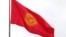 The flag of Kyrgyzstan and the statue of Manas. Bishkek city, January 8, 2024