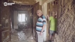 В Херсоне люди возвращаются в разрушенные от затопления дома 