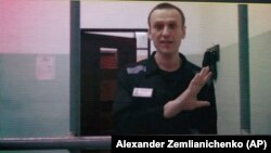 Алексей Навальный участвует в заседании суда по видеосвязи из колонии во Владимирской области, 23 августа 2023 года. Фото: AP