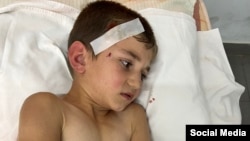 Один из раненных в результате обстрела со стороны Азербайджана карабахских детей