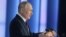 RUSSIA – Russian President Vladimir Putin delivers his annual address to the Federal Assembly in Moscow, February 21, 2023 