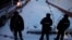 RUSSIA -- Police officers stand outside a police station 