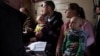 Жители села Миньковка Бахмутского района Донецкой области в эвакуационном поезде, 13 февраля 2023 года