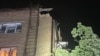 Киев, поврежденный от удара беспилотника жилой дом 