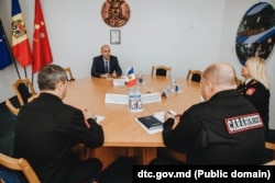 Константин Зябликов (в центре) на встрече с руководством Главного управления карабинеров полиции Молдовы, август 2021 года