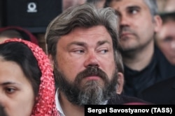 Председатель Совета директоров группы компаний "Царьград" Константин Малофеев в храме Георгия Победоносца на Поклонной горе в Москве, Фото ТАСС, 6 мая 2023 года