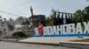 СК РФ сообщил о задержании двух подозреваемых в расстреле девяти человек в оккупированном Россией городе Волноваха в Донецкой области