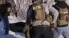 ГосТВ Беларуси показало арест "диверсантов, работавших на украинские спецслужбы". Кто они такие?