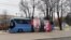 Bus with Putin depiction outside of Russian embassy in Riga
