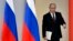 Russian President Vladimir Putin arrives to deliver his annual state of the nation address