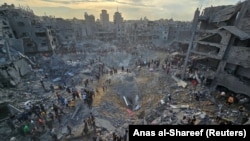 Место удара в лагере беженцев "Джабалия" на севере сектора Газа, 31 октября 2023 года 