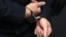 GERMANY -- Stephan Balliet, who is accused of shooting dead two people after an attempt to storm a synagogue in Halle an der Saale, eastern Germany, has his hands cuffed as he arrives into the courtroom 