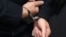GERMANY -- Stephan Balliet, who is accused of shooting dead two people after an attempt to storm a synagogue in Halle an der Saale, eastern Germany, has his hands cuffed as he arrives into the courtroom 