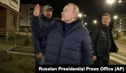 Владимир Путин в Мариуполе 19 марта 2023 года