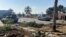 Gaza - Israeli military vehicles operate in the Gazan side of the Rafah Crossing, amid the ongoing conflict between Israel and Palestinian Islamist group Hamas, in the southern Gaza Strip, in this handout image released on May 7, 2024