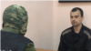 Российский суд в так называемой "ДНР" приговорил бойца "Азова" к 16 годам колонии строгого режима