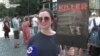 "Если Украина выиграет в войне, Россия станет свободной". В Праге прошла акция сторонников Навального "Путин – убийца"