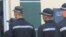 Tajik prisoners buy groceries    