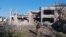 Разрушенные в результате российских обстрелов дома в городе Волчанск Харьковской области, 12 мая 2024 года