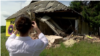 Один из разрушенных во время российской оккупации домов в Гостомеле, Киевская область. Съемки Настоящего Времени, июль 2022 года