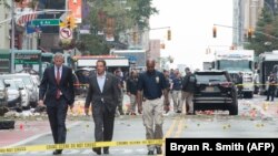 Губернатор штата Нью-Йорк Эндрю Куомо и мэр города Билл ди Блазио на месте происшествия