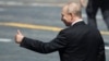 Russian President Vladimir Putin leaves Red Square after a military parade on June 24, 2020 that commemorated the 75th anniversary of the victory over Nazi Germany in World War II. 