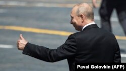 Russian President Vladimir Putin leaves Red Square after a military parade on June 24, 2020 that commemorated the 75th anniversary of the victory over Nazi Germany in World War II. 