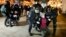 Russia Ukraine War -- Police detain demonstrators during an action against Russia's attack on Ukraine in St. Petersburg, Russia, Tuesday, March. 1, 2022.