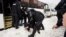 UKRAINE-CRISIS/RUSSIA-PROTESTS/A person is detained during an anti-war protest, following Russia's invasion of Ukraine, in Yekaterinburg, Russia March 6, 2022. 