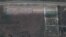 UKRAINE - Satellite photo of the probable place of mass burial in the village of Mangush, April 9, 2022