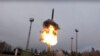RUSSIA -- An intercontinental ballistic missile Avangard lifts off from a truck-mounted launcher somewhere in Russia, undated