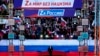 Владимир Путин на концерте в "Лужниках" 18 марта 2022 года. Фото: президентский пул via AP