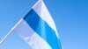 В Великом Новгороде муниципальную депутатку оштрафовали из-за фотографий с митингов в Риге и Варшаве с бело-сине-белым флагом