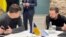 Deputy heads of Ukraine's Presidential Office Kyrylo Tymoshenko and Ukraine's presidential advisor Mykhailo Podolyak wait for the beginning of talks with the Russian delegation, as Russia’s attack on Ukraine continues, in Istanbul, Turkey March 29, 2022. 