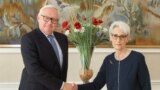 SWITZERLAND -- Russian Deputy Foreign Minister Sergei Ryabkov (L) and U.S. Deputy Secretary of State Wendy Sherman shake hands at the start of a second round of U.S.-Russia strategic dialogue, in Geneva, September 30, 2021