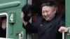 RUSSIA -- North Korean leader Kim Jong Un waves from his train as he leaves Khasan train station in Primorye region, April 24,2019