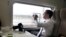 CHINA -- Russia's President Dmitry Medvedev takes pictures as he travels by high-speed train from Sanya to Boao to take part in the 10th Boao Forum for Asian Annual Conference, April 15, 2011.  