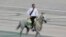 TURKMENISTAN -- Turkmen President Gurbanguly Berdymukhamedov rides a horse at a parade marking the Independence Day in Ashgabat, September 27, 2021