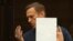 Russian opposition leader Aleksei Navalny, accused of flouting the terms of a suspended sentence for embezzlement, attends the February 2, 2021 court hearing in Moscow on the government's request that he be sentenced to prison for 3 1/2 years.