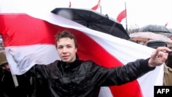 Raman Pratasevich shown during a March 25, 2012 march in Minsk, Belarus to commemorate the 1918 foundation of the Belarusian Democratic Republic