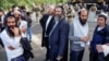 UKRAINE - Jewish pilgrims, who plan to enter Ukraine for a pilgrimage from the territory of Belarus, gather in front of Ukrainian service members near Novi Yarylovychi crossing point in Chernihiv Region, Ukraine September 15, 2020