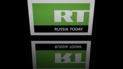 The Two Faces Of RT: Russia's Competing COVID Narratives