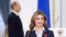 Russia -- Olympic artistic gymnastic champion Alina Kabayeva walks after being awarded by President Vladimir Putin in Moscow, December 21, 2005